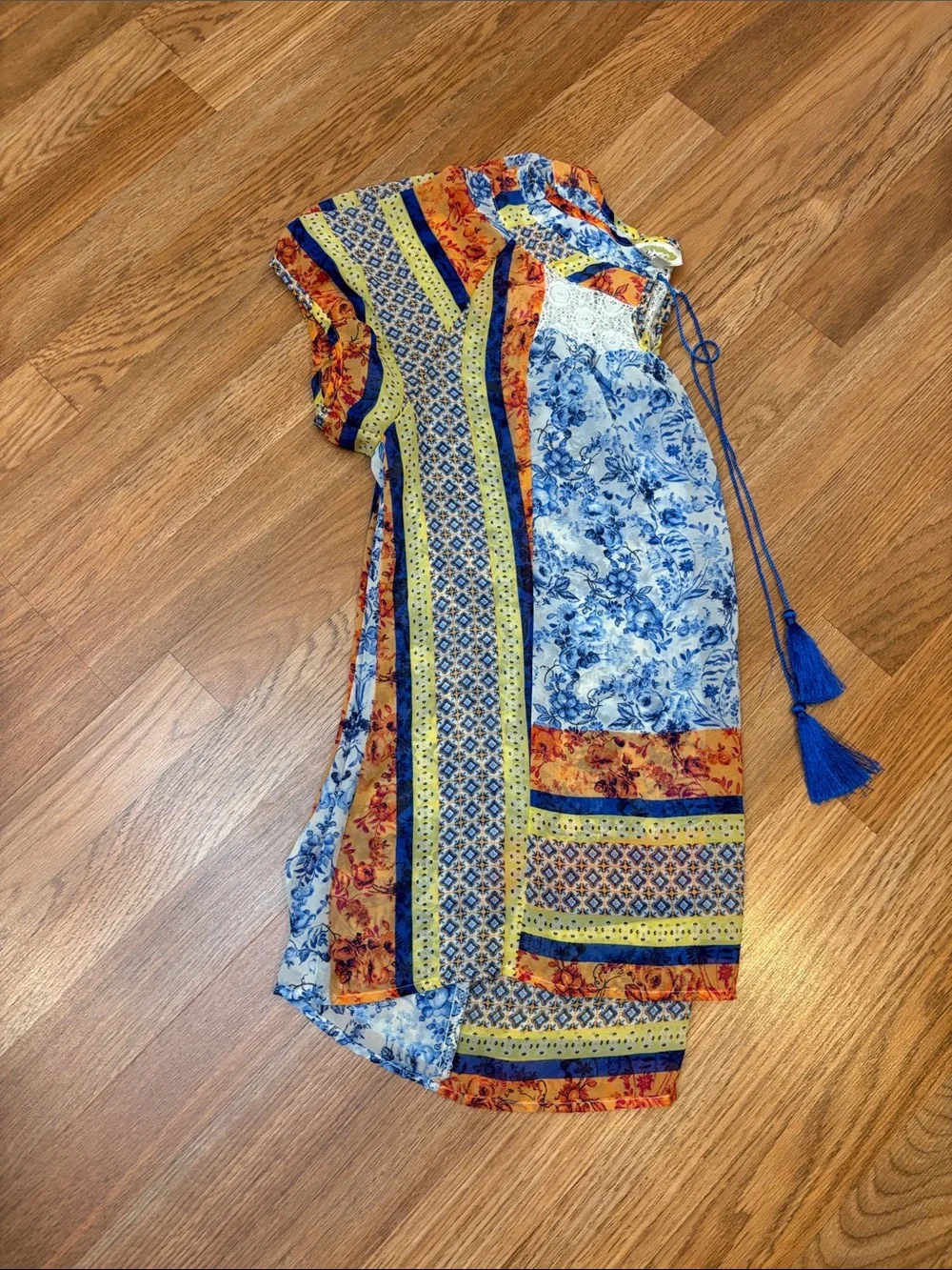 Fig & Flower blue, yellow & orange short sleeve semi-sheer top. Size M.
